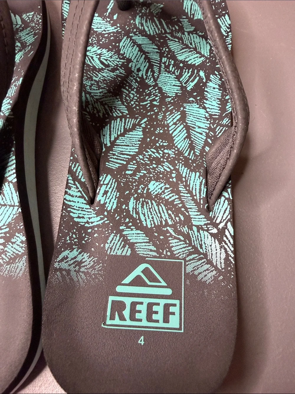 Kid’s Reef Blue & Black Patterned Flip Flops. Size: 4